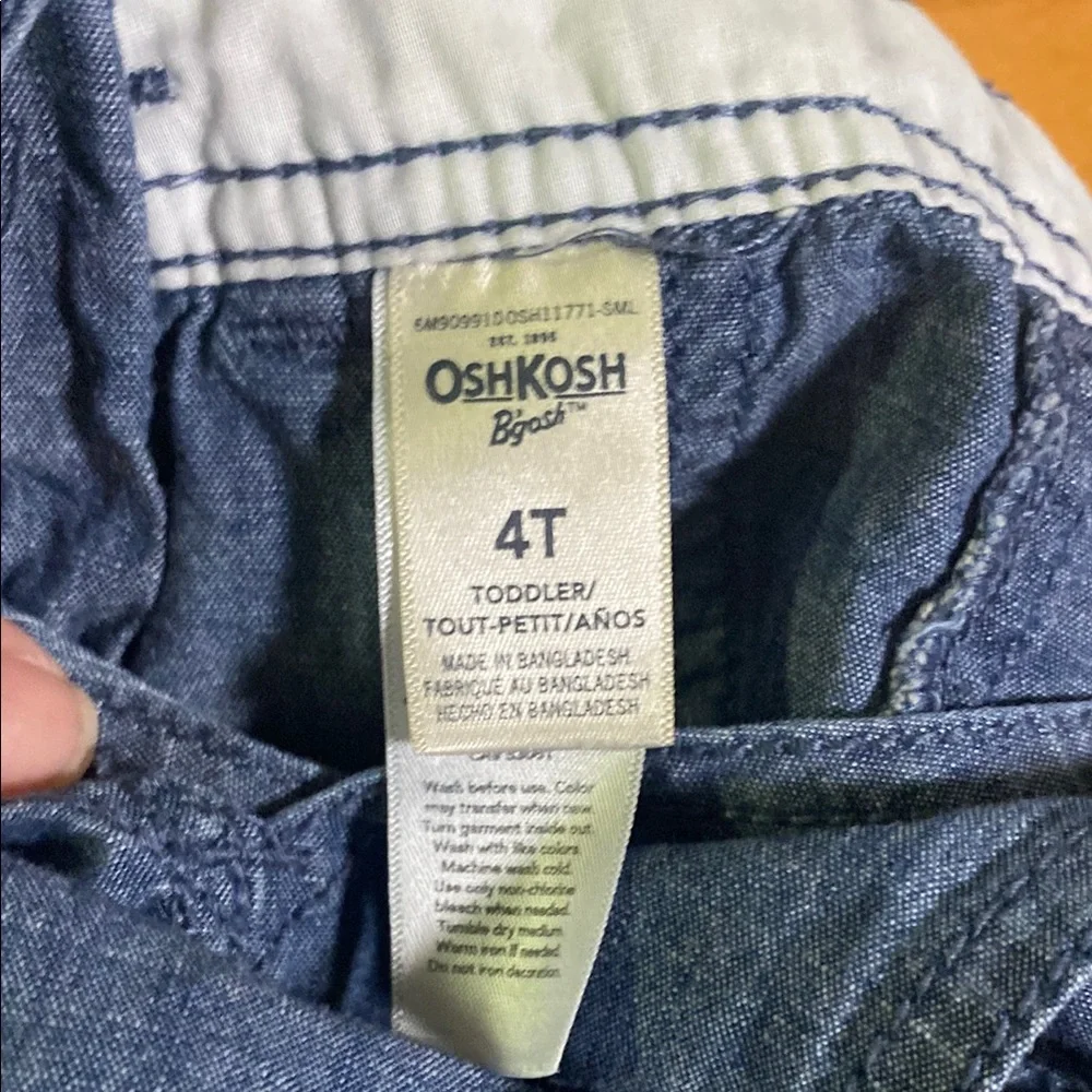 OshKosh B'gosh Classic Blue Denim Overalls with tiny dinosaurs wear long or roll